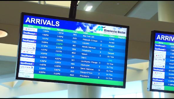 Arrivals board at Manchester Airport